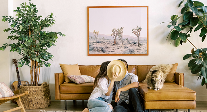 Couple Kissing Behind Hat - Toggle Renters Insurance