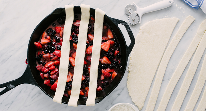 Pie Being Prepared in a Skillet 