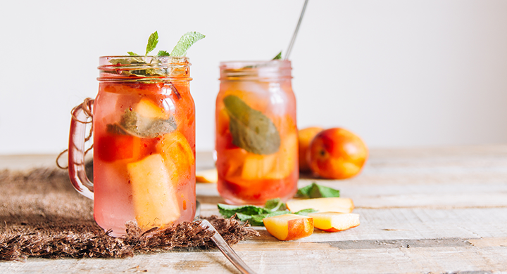 Drinks with Fruit Chunks in Mason Jars 