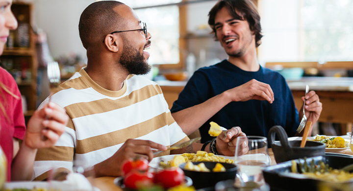 Guys Eating Together at a Table