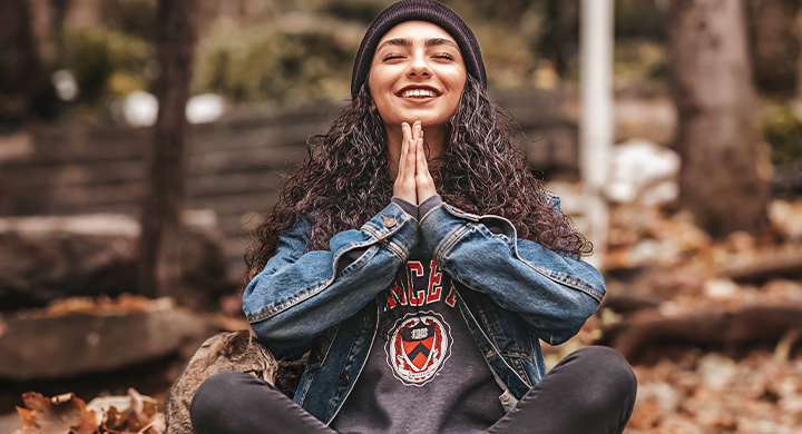 Woman Doing Yoga Outdoors - Toggle Insurance 