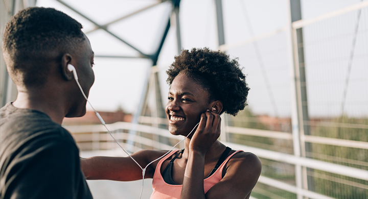 Two People Listening to Music - Toggle Insurance 