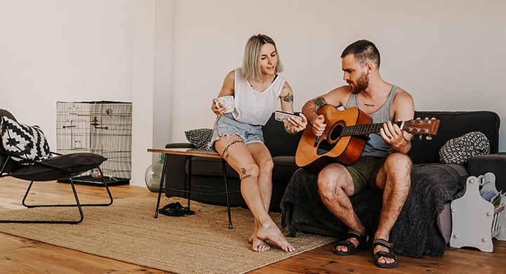 Two People Playing Music - Toggle Renters Insurance