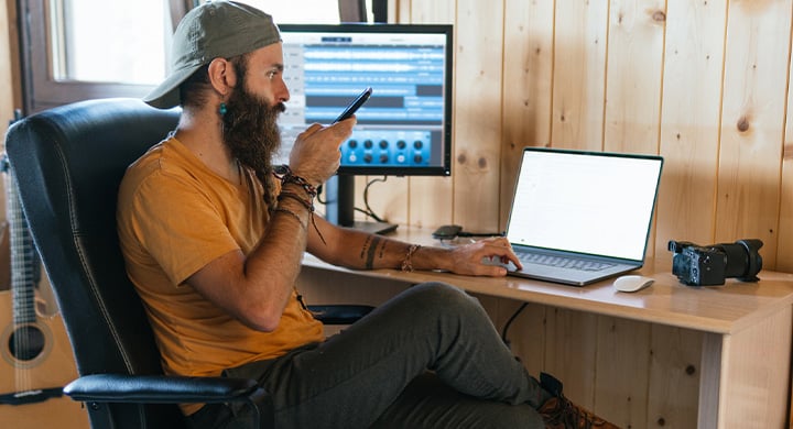  Man on His Computer - Toggle Renters Insurance Cost