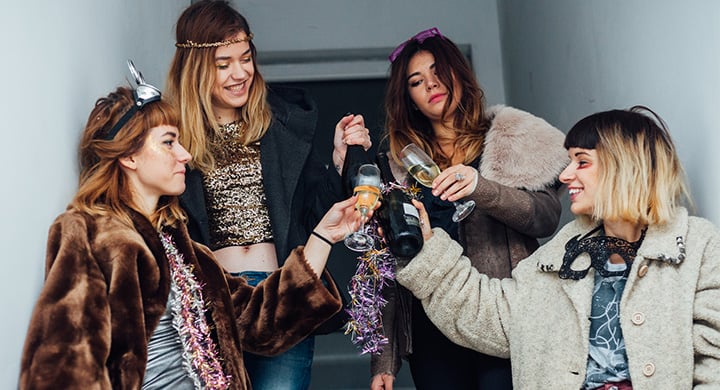 Group of Girls Toasting with Drinks - Toggle Renters Insurance Cost