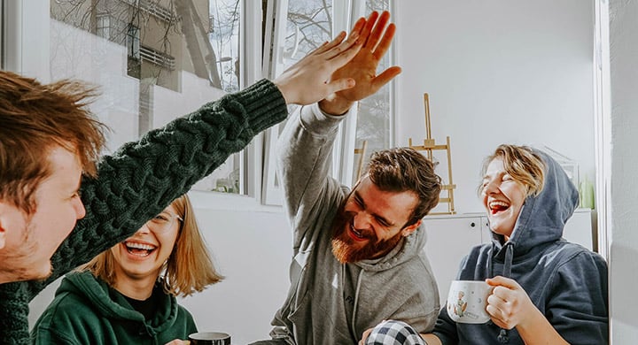  People High Fiving - Toggle Affordable Renters Insurance 