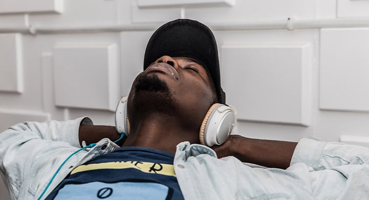 Man Listening to Music on Headphones - Toggle Renters Insurance