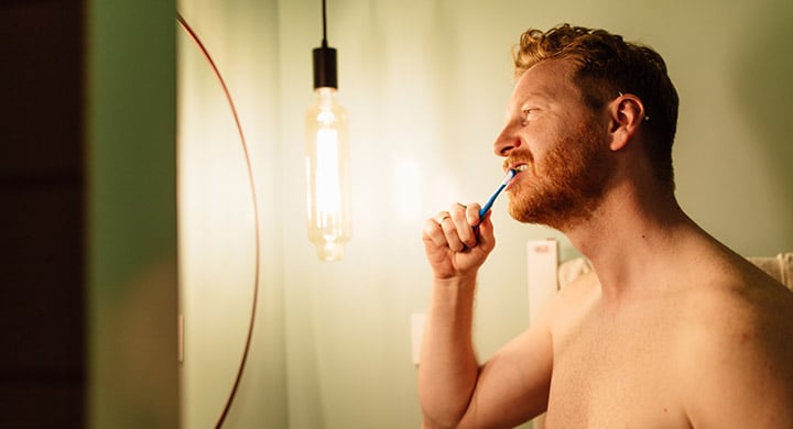 Man Brushing Teeth - Toggle Renter’s Insurance